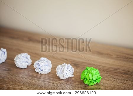 Great Idea Concept. Crumpled Colorful Paper On Wooden Table