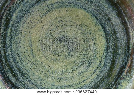 Background Of Old Pottery With Molds Of Mint