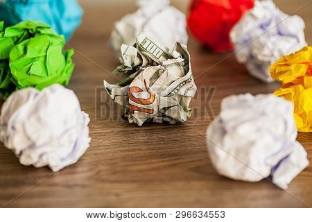 Great Idea Concept. Crumpled Colorful Paper On Wooden Table