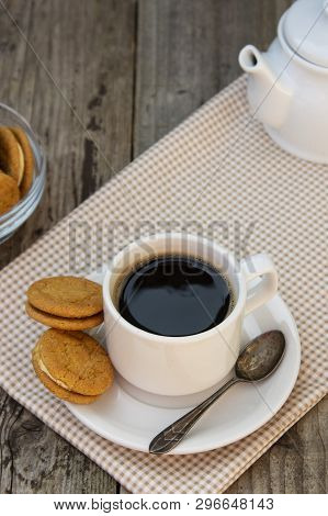 Cup Of Coffee With Sweet Cookies, Ginger Bread. Abstract Breakfast Image. Rustick Wooden Background.