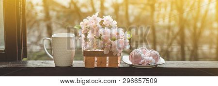 Cozy Spring Still Life: Cup Of Hot Tea With Spring Bouquet Of Flowers On Vintage Windowsill With A P