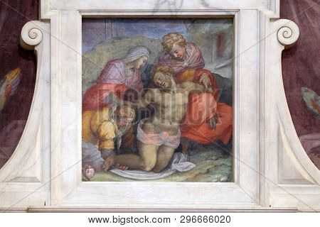 FLORENCE, ITALY - JANUARY 10, 2019: The tomb of Michelangelo (detail). Pieta fresco by Giovanni Battista Naldini, Basilica of Santa Croce (Basilica of the Holy Cross) in Florence, Italy.