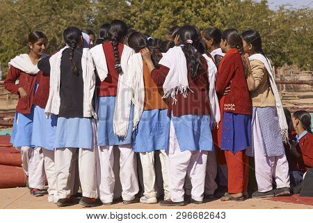 Nagaur, Rajasthan, India - February 14, 2008: Group Of School Girls Find Something Interesting At Th