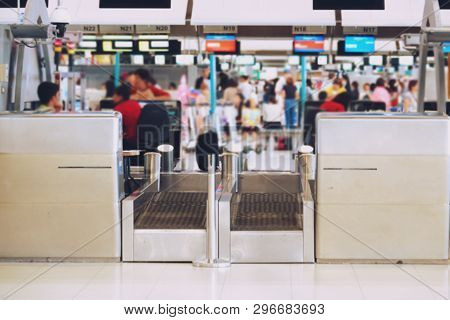 Blurred Airport Check In Desk Counter Gate With Weighting Luggage Belt
