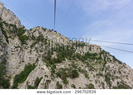 Ropes Tourist Lift Climb To The Top Of The High Crimean Mountain Ai-petri. The Rocks Are Beautifully
