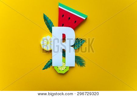 Letter R Cut From Paper With Tropical Fruit Paper