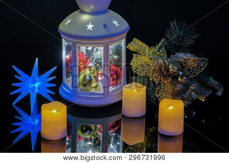 Happy New Year With A Flashlight Candles And A Spruce Branch