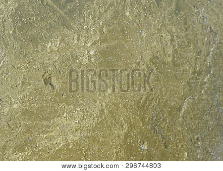 Thin Icy Board Against Strong Sun Light. In Ice Floe Are Visible Deep Cracks. Melting Of Arctic Ice