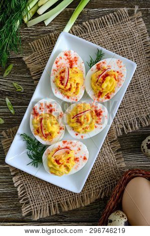 Deviled Eggs. Delicious Appetizer. Boiled Eggs Stuffed With Yolk, Mustard, Mayonnaise, Paprika. Clas