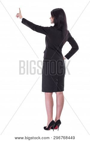 Rear View.business Woman Pointing To Virtual Point