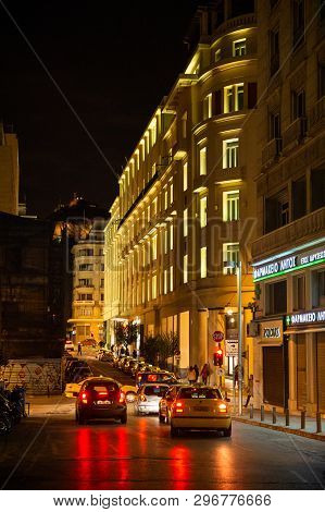 Athens, Greece - 26 Mar 2016: Cars And Taxis On The Panepistimiou Street Near Pharmacy And Zolotas J