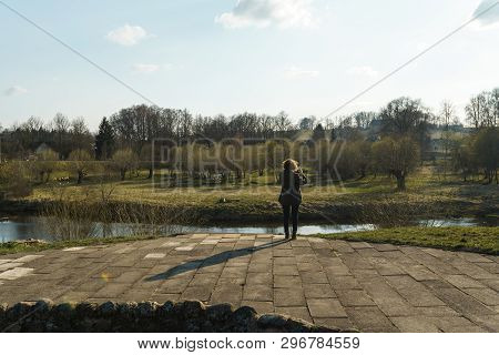 River With A Bridge In The Backround In Sabile, Latvia