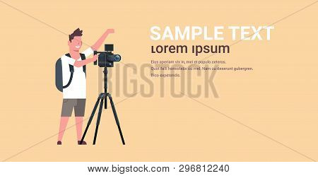 Professional Videographer Using Camera On Tripod Man Shooting Video On Steady Cam Horizontal Full Le