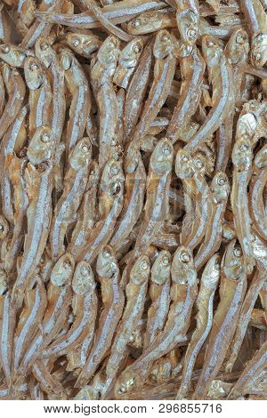 Plenty Of Small Dried Fish From Sea That Are Arranged In Group,top View Of Small Dried Fish Pattern,