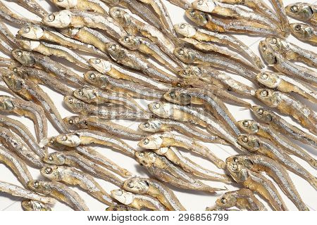 Plenty Of Small Dried Fish From Sea That Are Arranged In Group,top View Of Small Dried Fish Pattern,