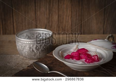 Thapthim Krop, Mock Pomegranate Seeds In Coconut And Syrup In The White Bowl On The Wood Table There
