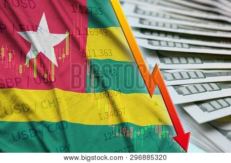Togo Flag And Chart Falling Us Dollar Position With A Fan Of Dollar Bills