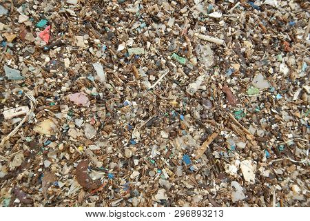 Micro Plastics Marine Debris On The Sand Beach.