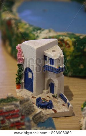 Small Toy House On The Sea Beach