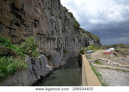 Scenic View Of Mediterranean Coastline In  Ansedonia Bay, With The Rocky Face Called 