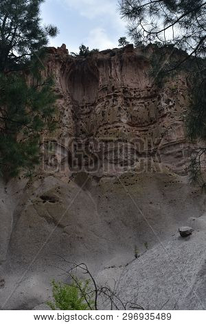 Tall Sandstone Cliffs That Contain Rooms, Chambers And Cliff Dwellings.