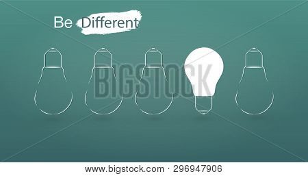 Hanging Light Bulbs With Glowing One Different Idea On Light Blue Background. Minimal Concept Idea.