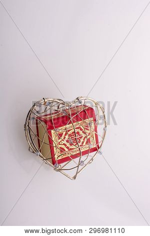 The Holy Quran In Mini Size In A Heart Shaped Cage