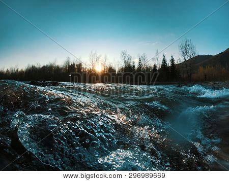 Landscape With Mountains Trees And A River In Front