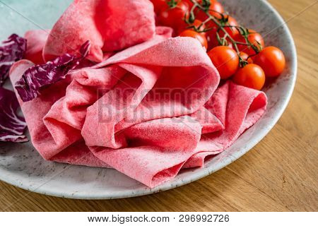 Lavash with tomatoes (soft, thin unleavened flatbread)
