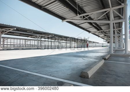 Car Parking Lot Area On Deck Floor Of Shopping Mall, Perspective View Empty Of Car Park Structure Bu