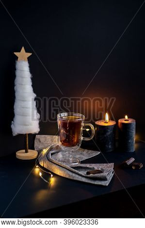 Cup Of Tea And Aromatic Candles In The Dark