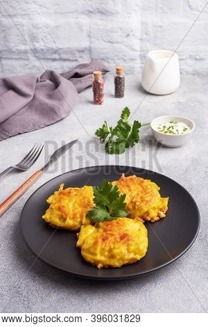 Fried Cakes Of Grated Potatoes On The Plate With Sauce. Traditional Pancakes Boxty Raggmunk.