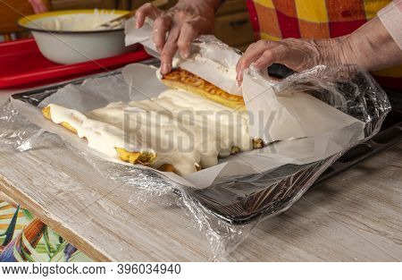 Woman Preparing Cherry Pie With Sour Cream At Home