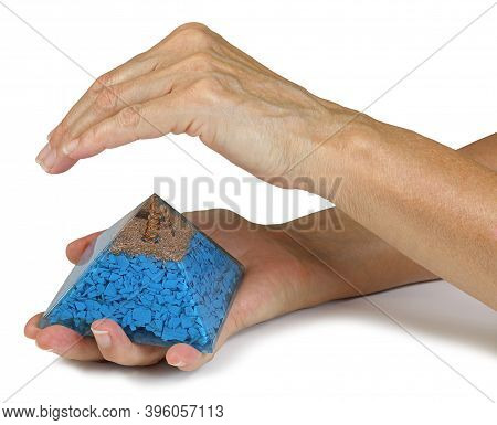 Sensing Subtle Orgone Pyramid Energy - Female Holding An Orgone Pyramid In Right Hand With Left Hand