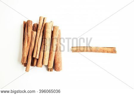 Cinnamon Sticks On The White Background With Copy Space For Your Text