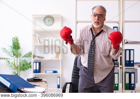 Businessman angry and furious at the workplace