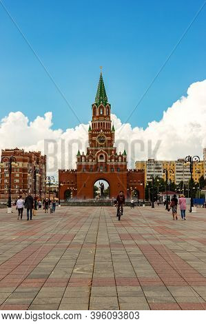 Yoshkar-ola, Mari El, Russia 30 July 2020: Kremlin Spasskaya Tower Suuny Day, Walking People. Select