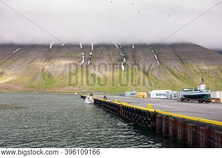 Isafjordur, Iceland - July 7, 2014: The Harbour And Pier Of The Isafjordur City In Iceland With Sams