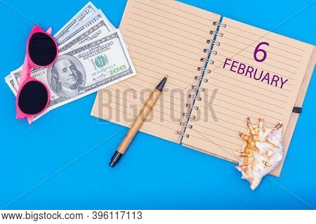 February 6th. 6th Day Of February. Travel Plan Flat Design With Notepad Written Date, Pen, Glasses, 