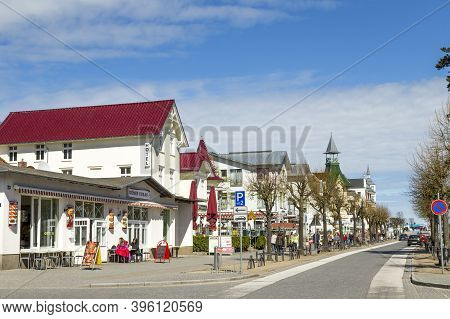 Zinnowitz, Germany - April 15, 2014: People Enjoy Walking Around The Scenic Old Houses In Zinnowitz,