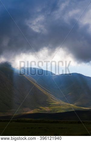 Dramatic mountain landscape near Castelluccio village in National Park Monte Sibillini, Umbria region, Italy
