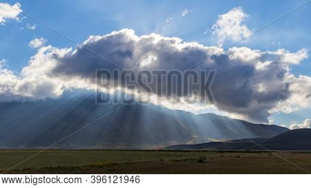 Dramatic mountain landscape near Castelluccio village in National Park Monte Sibillini, Umbria region, Italy