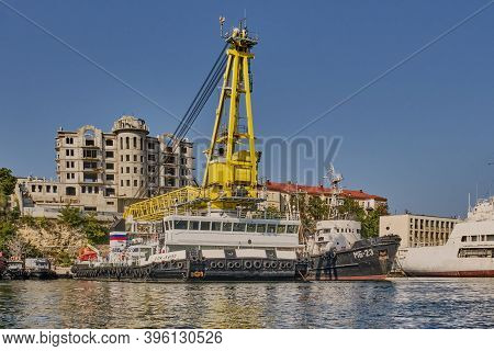 Sevastopol, Russia - September 26, 2020: Self-propelled Floating Crane Spk-54150 At The Pier Of The 
