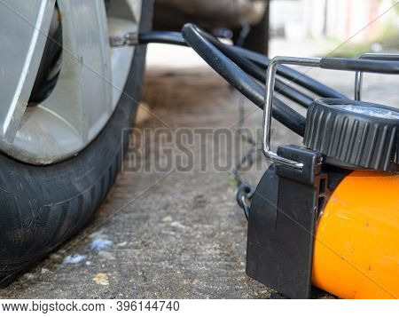 Pump Up The Autowheel Compressor On The Road. Car Electro Pump.