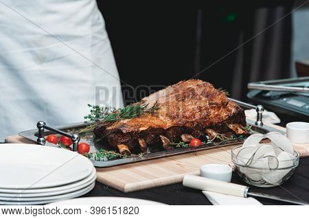 Homemade Bone-in Prime Rib Roast On Wooden Plank