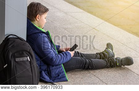 Young Boy Or Child Truancy By The School, Education Concept