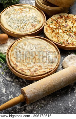 Three Types Of Classic Unleavened Wheat Flatbread With Herbs And Cheese Made From Flour, Eggs, Onion