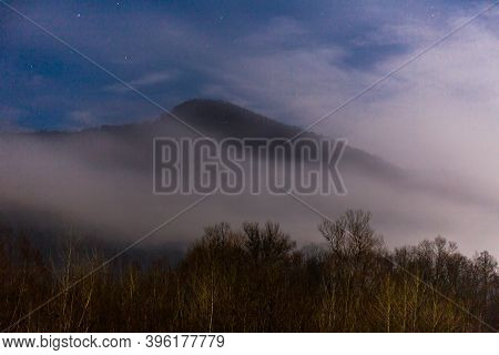 Beautiful Landscape With Cloudy Mountain At Twilight