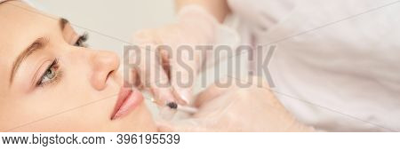 Near Eye Injection At Spa Salon. Doctor Hands. Closeup. High Quality. Pretty Female Patient. Beauty 
