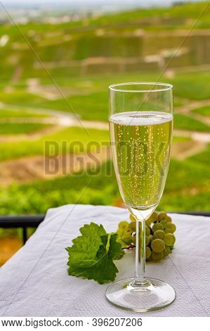 Tasting Of French Sparkling White Wine With Bubbles Champagne On Outdoor Terrace With View On Grand